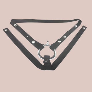 A flat view of the black 3 chastity belt, it is shown here with a chastity cage base ring rather than the included ring.