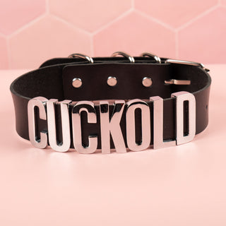 the Cuckold choker shown here with a black collar and silver lettering.