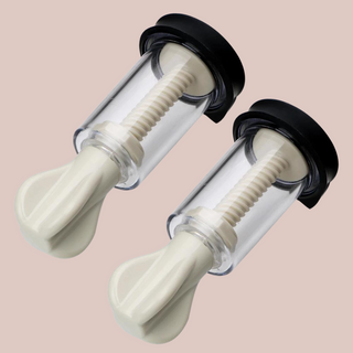 An angled view of the nipple stimulation cups, you can see the screws that with the rubber ends create the suction.