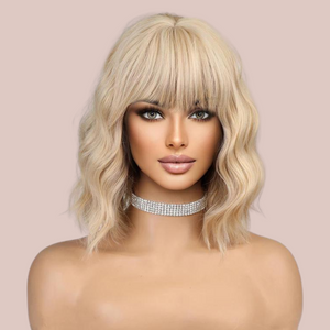 The golden blonde 16" wig from House Of Chastity shown with a styled wig.