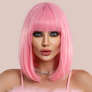 A beautiful bubble gum pink wig, this front view shows the blunt fringe and collar bone length.