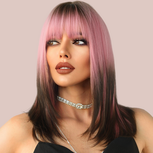 HOC9050-1 Pink/Black Ombre Shoulder Length Wig modelled for House of Chastity. Soft pink to black shoulder-length straight hair with a blunt fringe choppy ends.