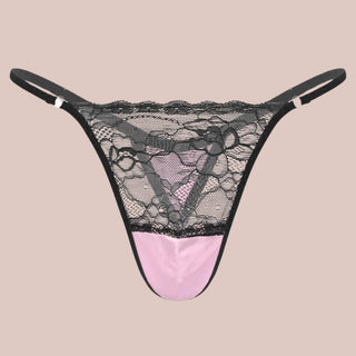 A close up front view of the Patchwork Lace Thong Panties, this image shows the black lace panties with a pink lower panel.