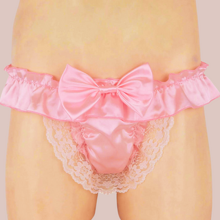 The peach satin bow knot panties being modelled.