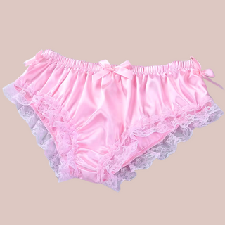 The satin soft panties shown here in pink, you can see the lace edging and bow detailing.