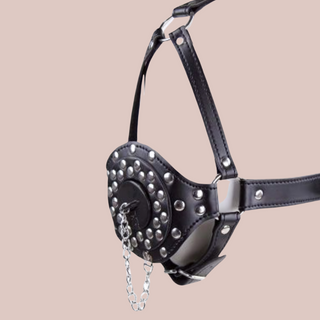 The Studded Head Gag shown as if being modelled, you can see the removable plug in the centre of the gag