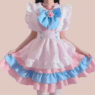 A front view of The Lucy Lou, its a frilly layered pink pinafore style sissy dress. You can see the under dress with peter pan collar, detachable paw print brooch and bow, pinafore style apron and white frilled head band.