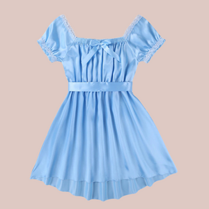 Shown here is the blue version of the satin night dress. It is an above knee length dress with a skater skirt, ruched satin bodice with decorative bow, square neckline, ruched and lace edged short sleeves and matching satin tie belt that has been tied at the back.
